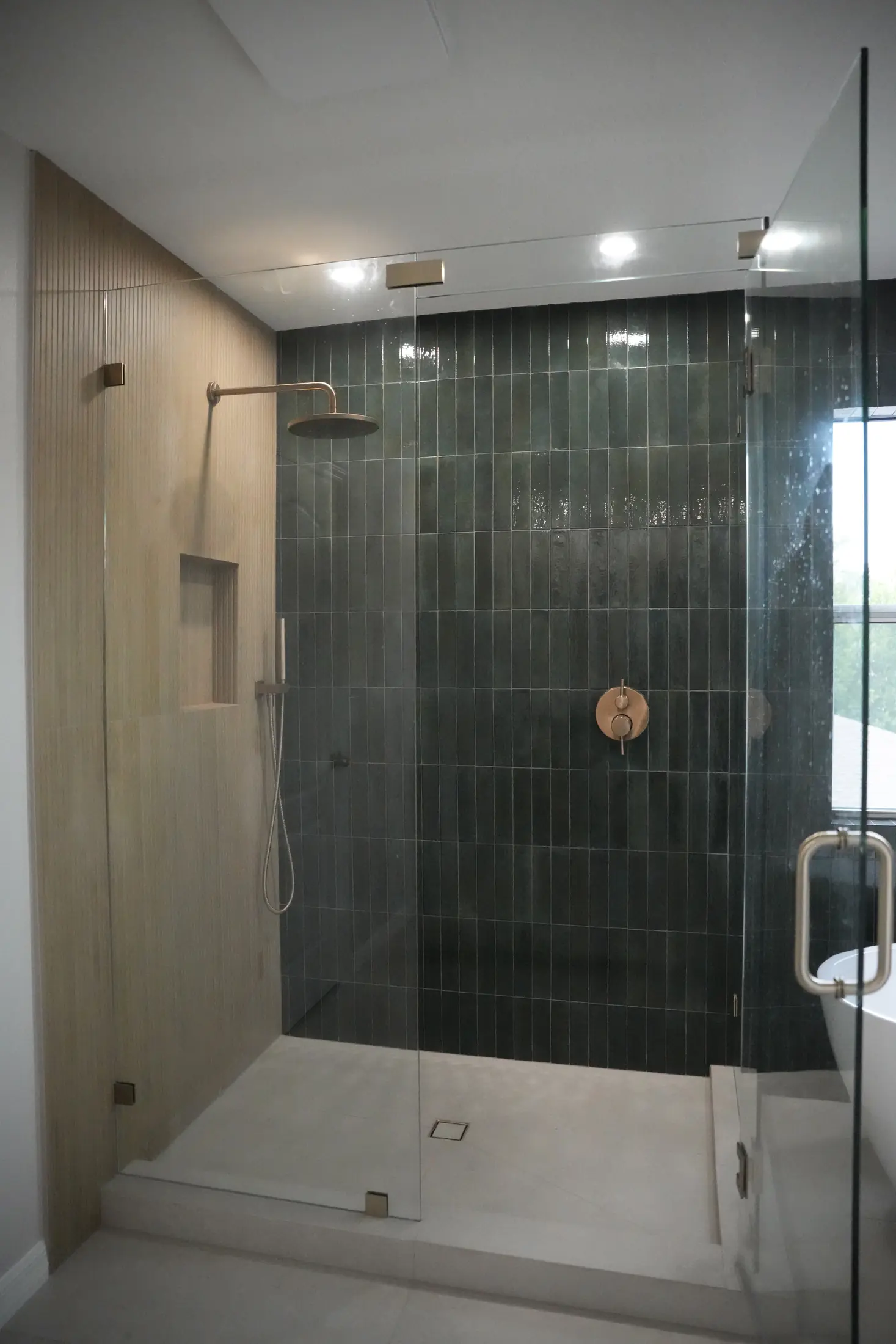 Green zellige bathroom designed and remodeled by CFN